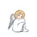 Angel baby with gold halo and wings.